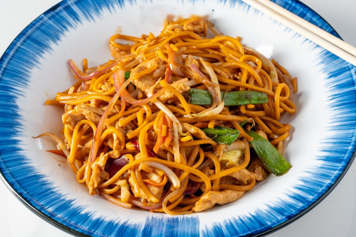 Chicken Lo Mein stir-fried egg noodles with bean sprouts - East Moon Centennial CO
