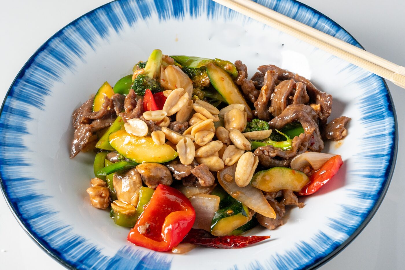 Kung Pao Beef stir-fried with chili, peanuts and vegetables - East Moon Centennial CO