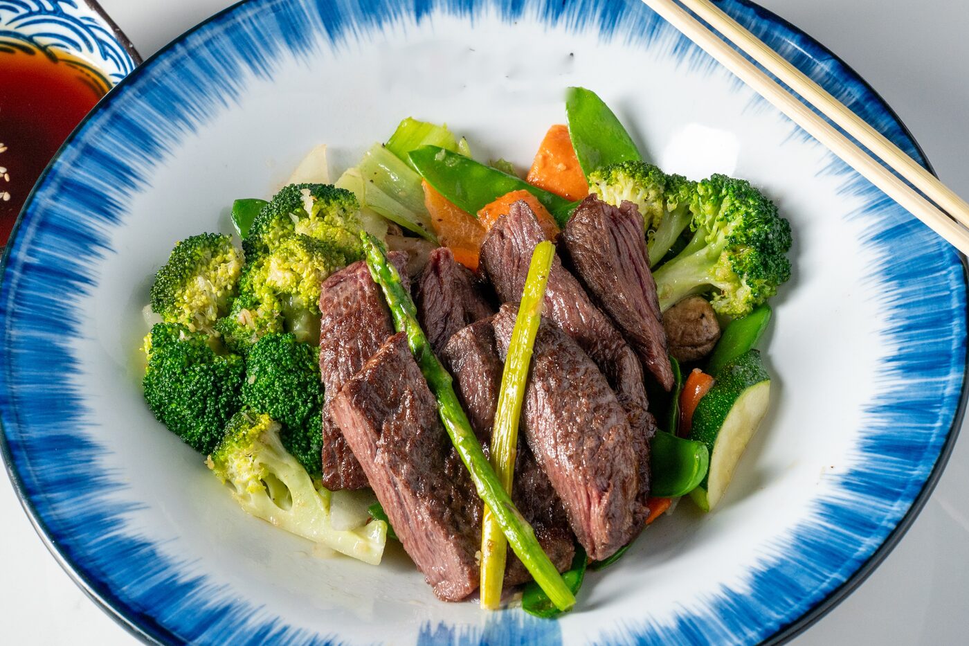 Beef Teriyaki Bento with sliced beef, broccoli and vegetables - East Moon Centennial CO