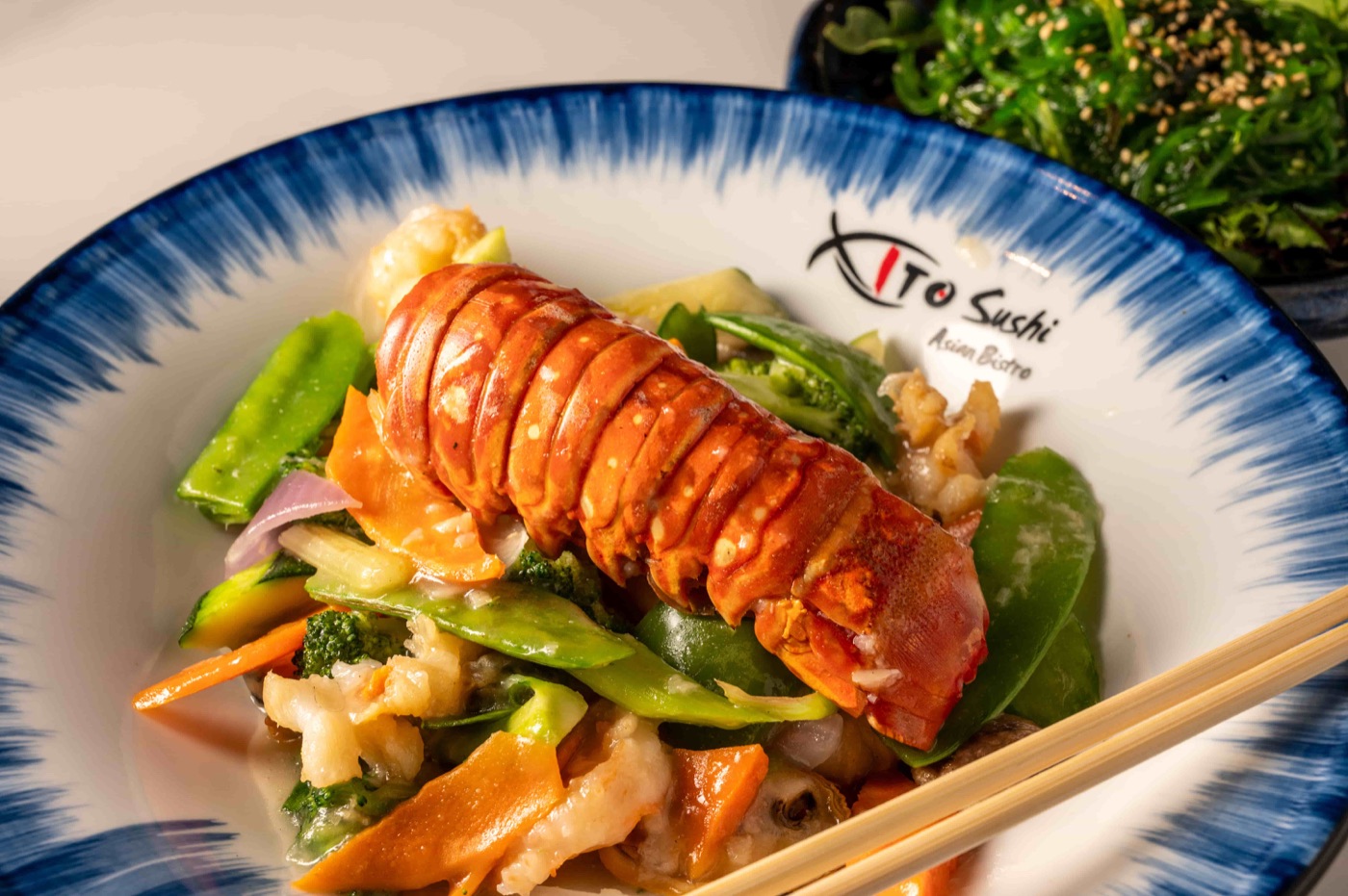 East Moon Seafood with whole lobster tail, shrimp, scallops and vegetables - East Moon Asian Bistro Centennial CO